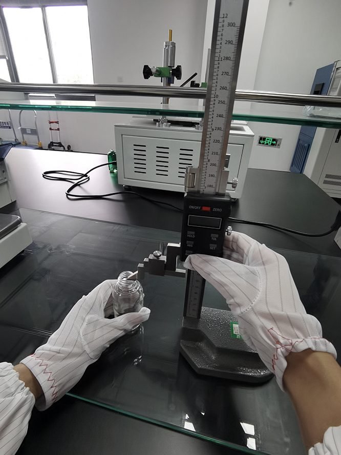 Measuring bottle height with a digital gauge
