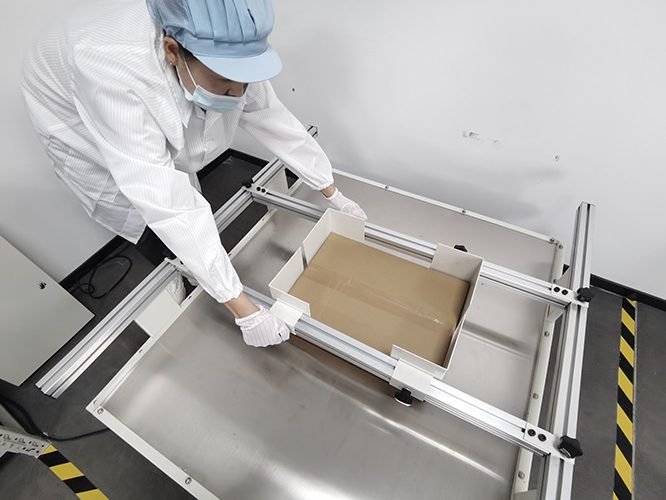 Operator packing cartons